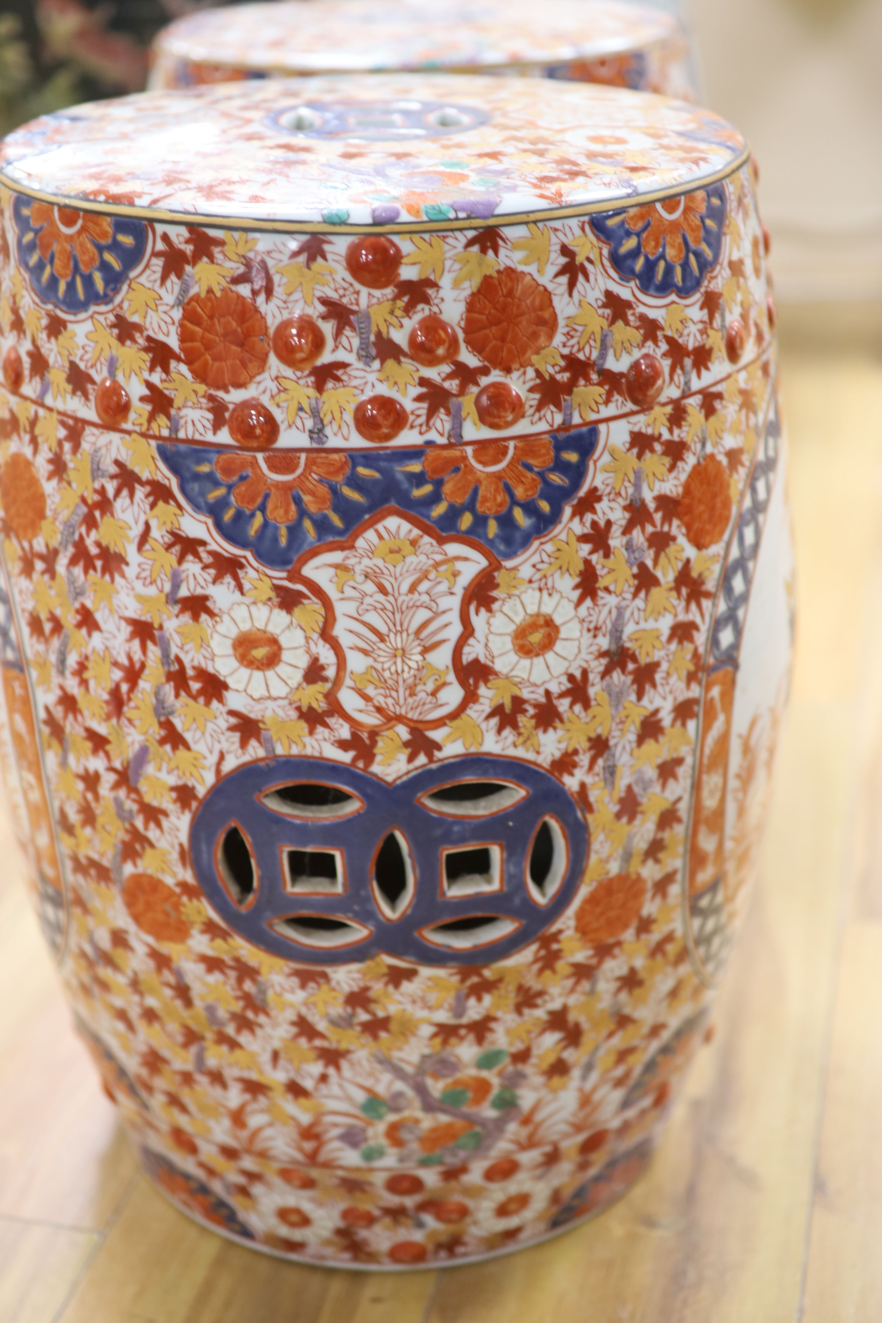 A pair of Chinese porcelain garden seats, height 48cm